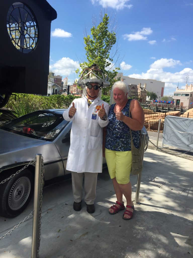 Doc Brown with the DeLorean from Back to the Future